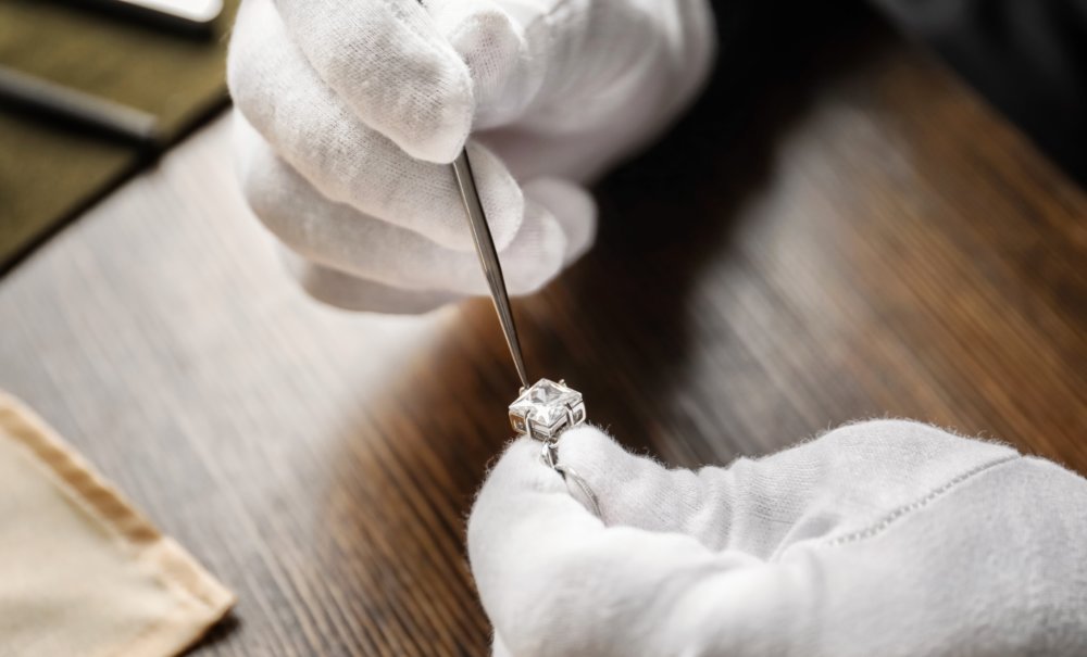jeweler fixing diamond ring