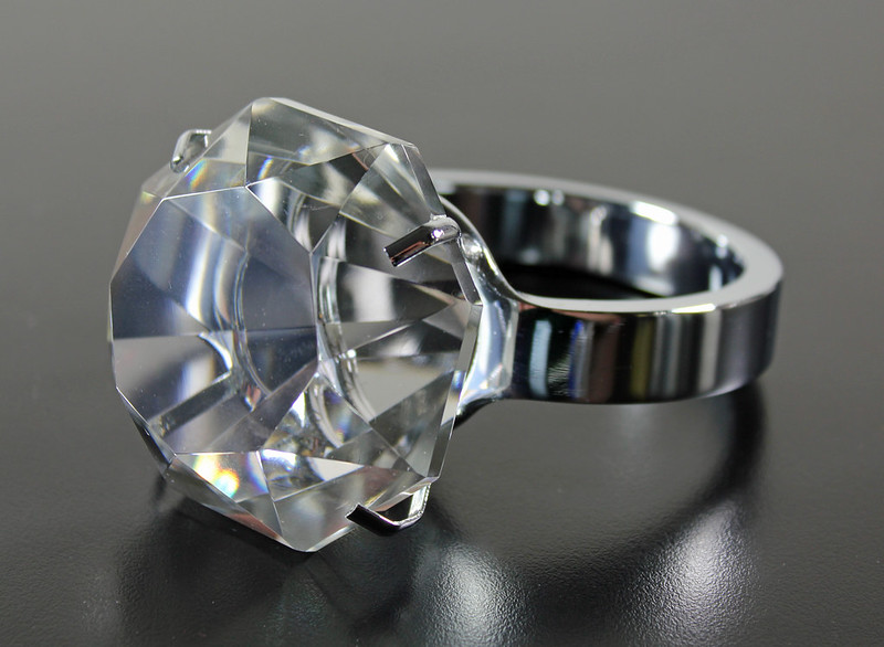 Diamond Engagement Ring against Graphite Background